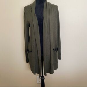 Women’s Sweater Size M Olive Green Faux leather detail on pockets and sleeves